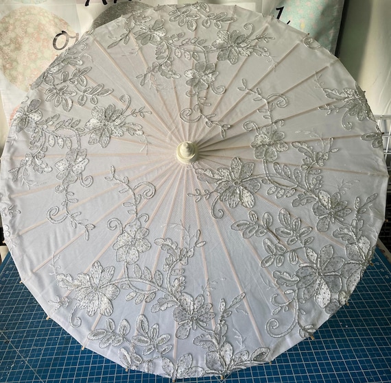 Silver filagree and sequin parasol