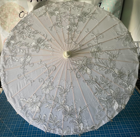 Silver filagree and sequin parasol