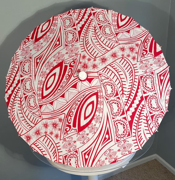 Red and white polynesian design parasol