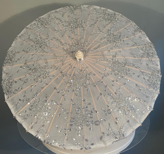 Silver filagree and sequin parasol