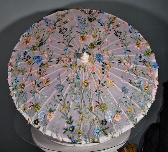 Embroidered 3D spring flowers parasol peach background