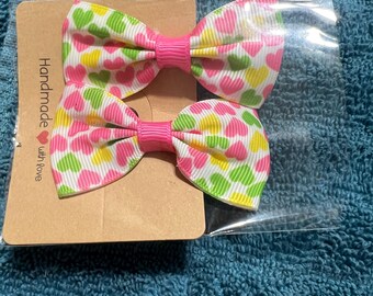 Lazo para el cabello con pinza de cocodrilo y diseño de corazón