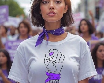May include: A white t-shirt with a purple fist raised in the air. The fist is wearing a purple bandana. The text "NO es NO" is printed below the fist.