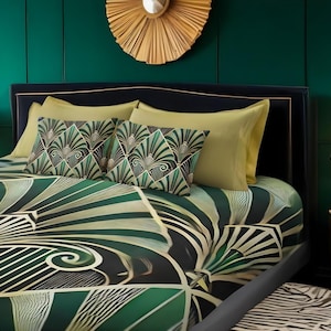 May include: A green and gold patterned bedspread with a geometric design. The bedspread is on a bed with matching pillowcases and throw pillows. The bed is in a room with green walls and a gold mirror.