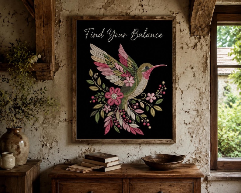 Floral hummingbird machine embroidery design with pink flowers, green leaves, cream feathers and botanical branches.