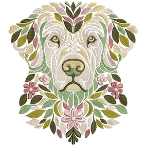 以下が含まれることがあります： 緑、ピンク、クリームの色合いの花と葉に囲まれた犬の顔の刺繍デザイン