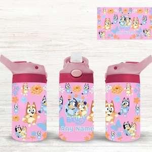 May include: Pink water bottle with cartoon dog characters, flowers, and butterflies. It has a flip-top lid and a space for a name. The design is repeated on the bottle and a matching card.