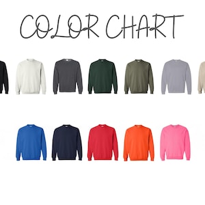 a group of different colored shirts on a white background