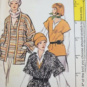 May include: Vogue Patterns sewing pattern featuring illustrations of three women wearing different knit outfits. The pattern includes a jacket, tunic, and coat. The pattern number is 9557, and the price is $3.00.