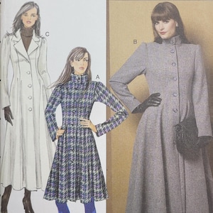 May include: A Butterick sewing pattern, B5425, featuring illustrations of women's coats. The coats include a white coat, a houndstooth coat, and a gray coat. The pattern size is AA (6-8-10-12).
