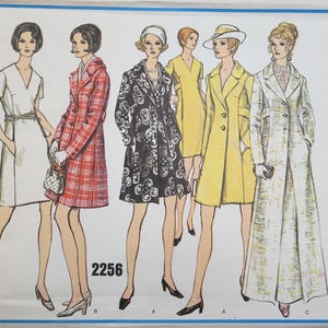 May include: Vintage Vogue's Basic Design sewing pattern featuring illustrations of women's coats and dresses. The designs include a white dress, a red plaid coat, a black and white patterned coat, a yellow coat, and a long white coat. The pattern number is 2256.