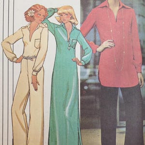 May include: Illustration of three outfits: a cream-colored jumpsuit, a long, light green dress, and a red tunic paired with black pants. All feature collared necklines and long sleeves, showcasing vintage fashion.