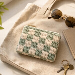 Crochet zipper pouch as a small travel bag with sunglasses and a tote