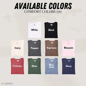 May include: An image showcasing a variety of t-shirts in different colors, including white, black, ivory, pepper, espresso, blossom, crimson, moss, blue jean, and navy. The text "AVAILABLE COLORS" and "COMFORT COLORS 1717" are displayed at the top.