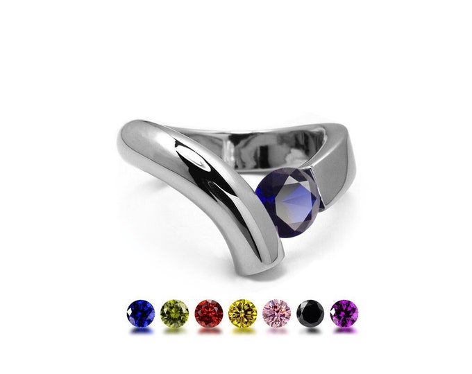 ONDE Flat and rounded tubular bypass ring with tension set colored gemstone in stainless steel by Taormina Jewelry