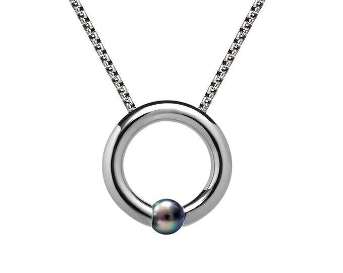 Necklace with a center ring & tension set black pearl in stainless steel by Taormina Jewelry