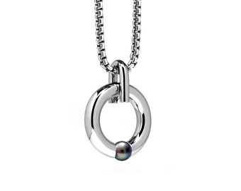 LUNA round tubular pendant with tension set black pearl in stainless steel by Taormina Jewelry