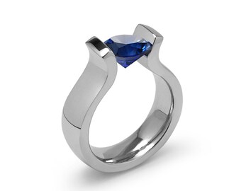 0.75ct Blue Sapphire Lyre shaped Tension Set Ring in Stainless Steel by Taormina Jewelry