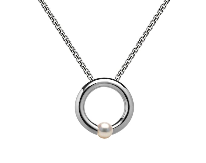 LUNA round tubular pendant hanging on a chain with tension set white pearl in stainless steel by Taormina Jewelry