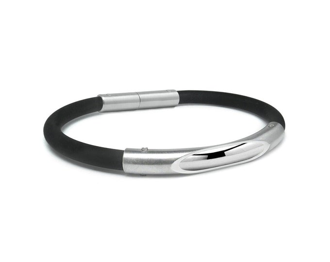 Tubular black rubber bracelet with see through rod detail, in stainless steel by Taormina Jewelry