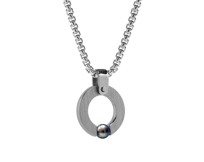 ABBRACCI round flat pendant with tension set black pearl in stainless steel by Taormina Jewelry