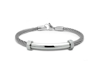 CABLE bracelet with curved tubular element and hex nuts in stainless steel, 4mm. By Taormina Jewelry