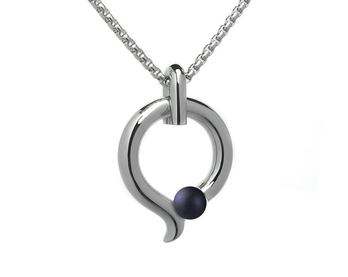 Tension set Obsidian on teardrop shaped pendant in stainless steel by Taormina Jewelry