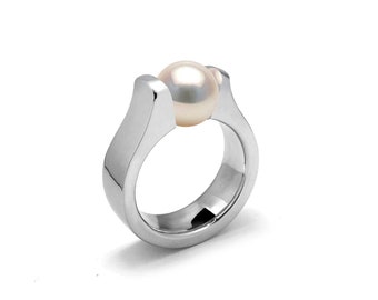 MAREA Flat and rounded high mounting ring with tension set white pearl in stainless steel by Taormina Jewelry