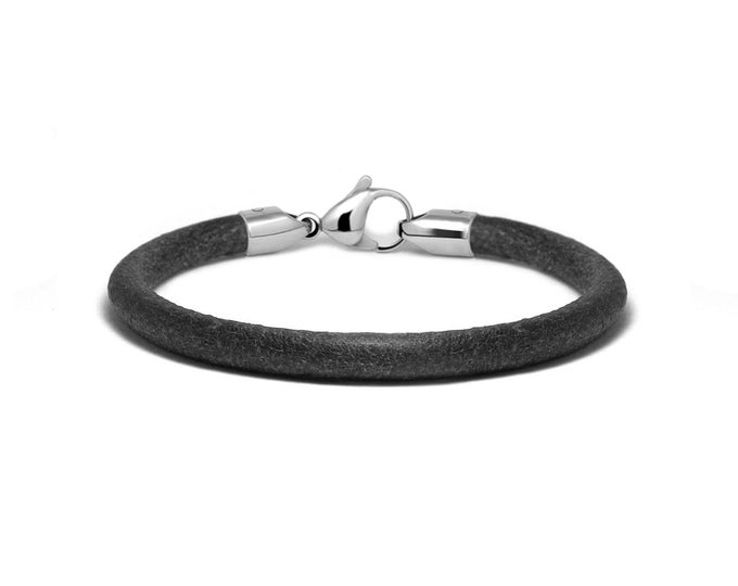 Tubular black 5mm leather bracelet with lobster clasp in stainless steel by Taormina Jewelry