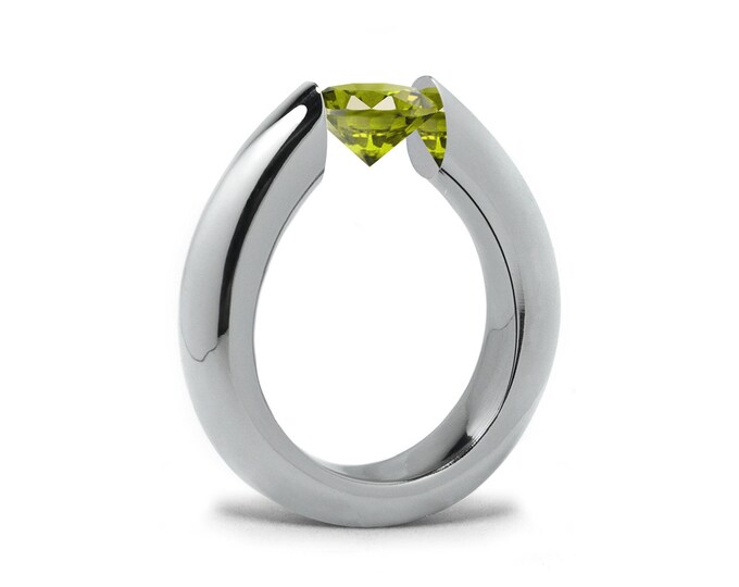 1.5ct Peridot tension set ring high rise stainless steel mounting by Taormina Jewelry