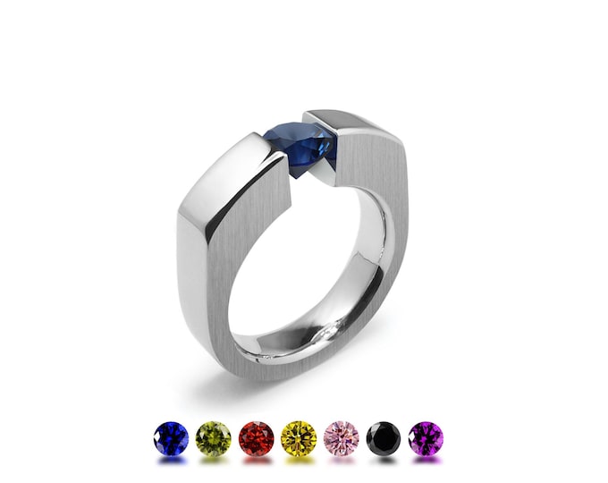 ABBRACCI Flat side tension set ring with tension set colored gemstones in stainless steel by Taormina Jewelry