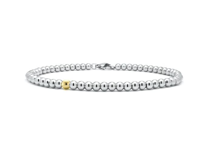 3mm beaded bracelet with a single gold bead in stainless steel by Taormina Jewelry