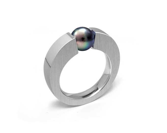 ABBRACCI Two tone flat mounting ring with tension set black pearl in stainless steel by Taormina Jewelry