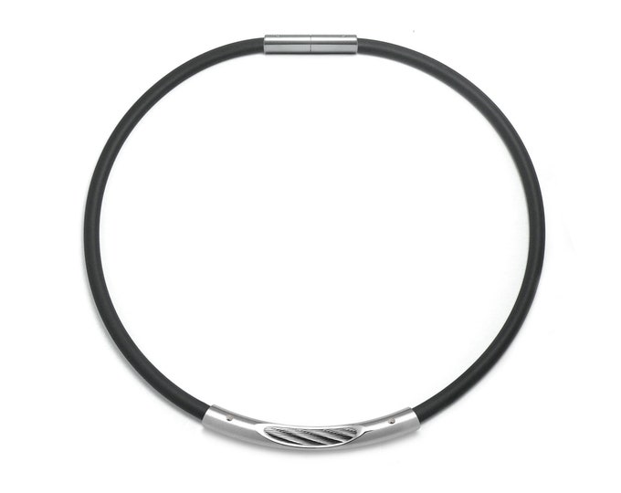 Tubular 5mm black rubber necklace with see through tubular element in stainless steel  by Taormina Jewelry