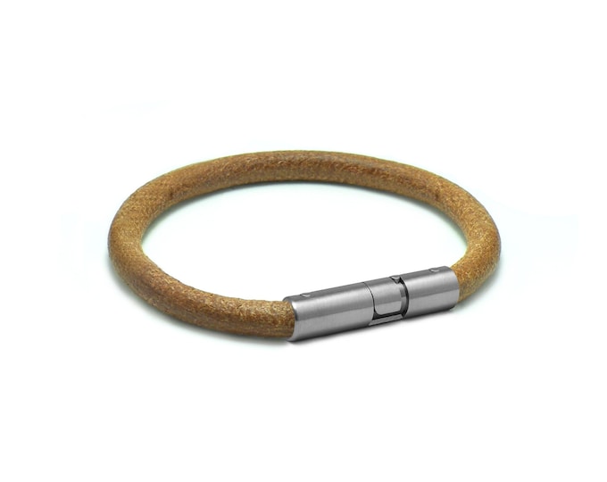 5mm tubular brown leather bracelet with twist bayonet clasp in stainless steel by Taormina Jewelry