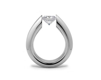 ALBA Tubular tapered high setting ring with a tension set white sapphire in stainless steel by Taormina Jewelry