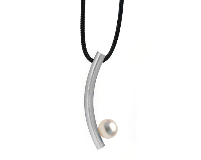 CURVE tubular curved vertical pendant with white pearl in stainless steel by Taormina Jewelry