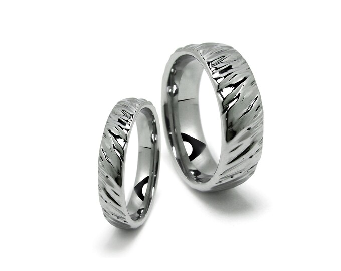 DUNE sculpted band ring with diagonal wrinkled design in stainless steel by Taormina Jewelry