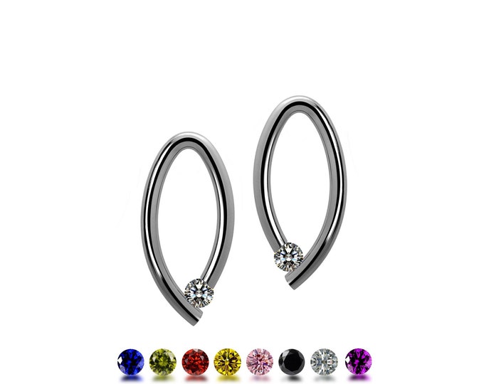OVUM oval cat eye shaped drop stud earrings with tension set colored gemstones in stainless steel by Taormina Jewelry
