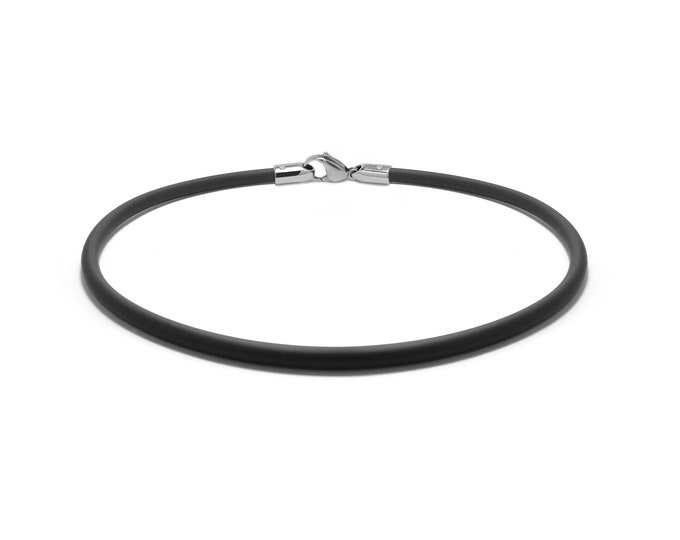 Tubular black rubber necklace with lobster clasp in stainless steel, 5mm. By Taormina Jewelry