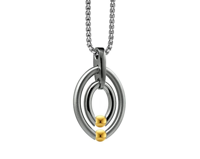OVUM double oval pendant with tension set gold spheres in stainless steel by Taormina Jewelry