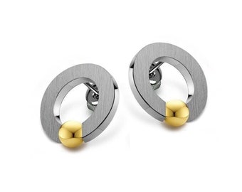 ABBRACCI Flat round stud earrings with tension set gold sphere in stainless steel by Taormina Jewelry