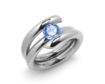 1.5ct Blue Topaz high setting bypass tension set ring in stainless steel by Taormina Jewelry
