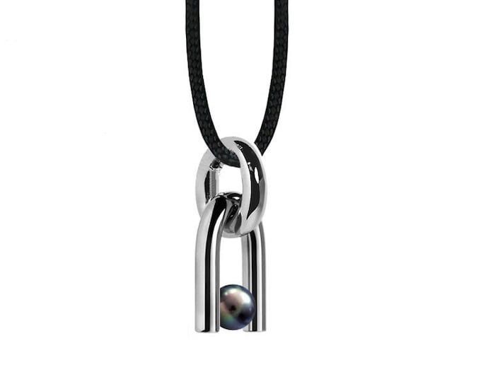 DIAPASON shaped tubular pendant with tension set Black Pearl in stainless steel by Taormina Jewelry