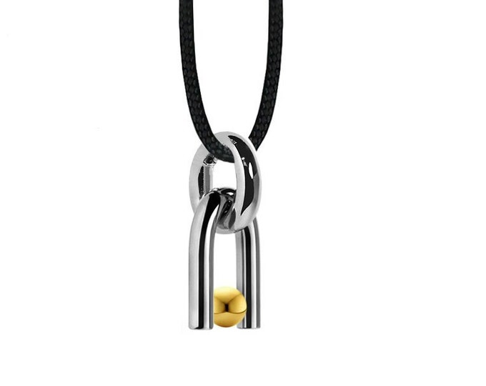 DIAPASON shaped tubular pendant with tension set Gold sphere in stainless steel by Taormina Jewelry