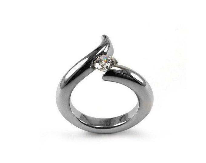 ONDE Swirl bypass ring with tension set white sapphire in stainless steel by Taormina Jewelry