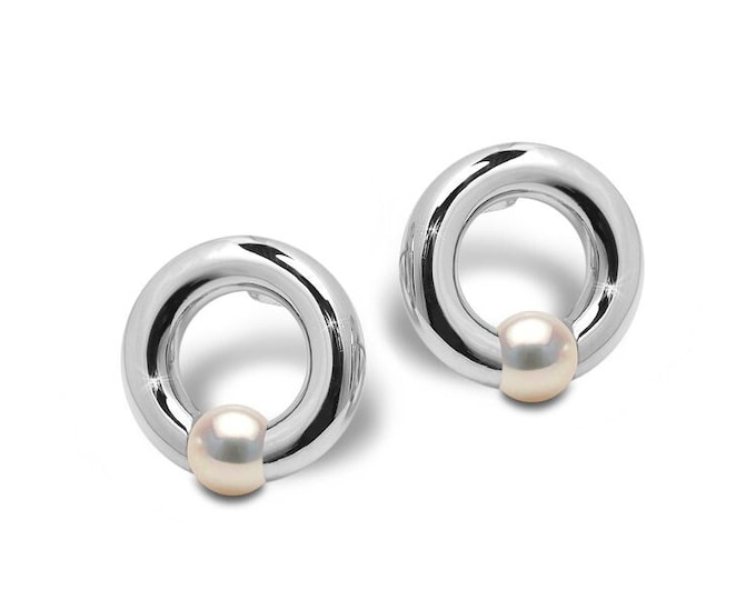 LUNA Circle tubular stud earrings with tension set white pearls in stainless steel by Taormina Jewelry