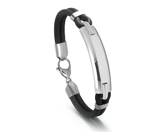Double tubular black rubber bracelet flat polished curved element in stainless steel by Taormina Jewelry