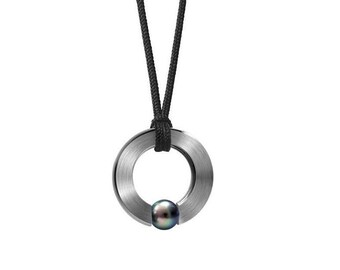 ABBRACCI flat round pendant on a cord with tension set black pearl in stainless steel by Taormina Jewelry