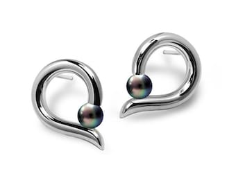 ONDE Teardrop shaped stud earrings with tension set black pearl in stainless steel by Taormina Jewelry